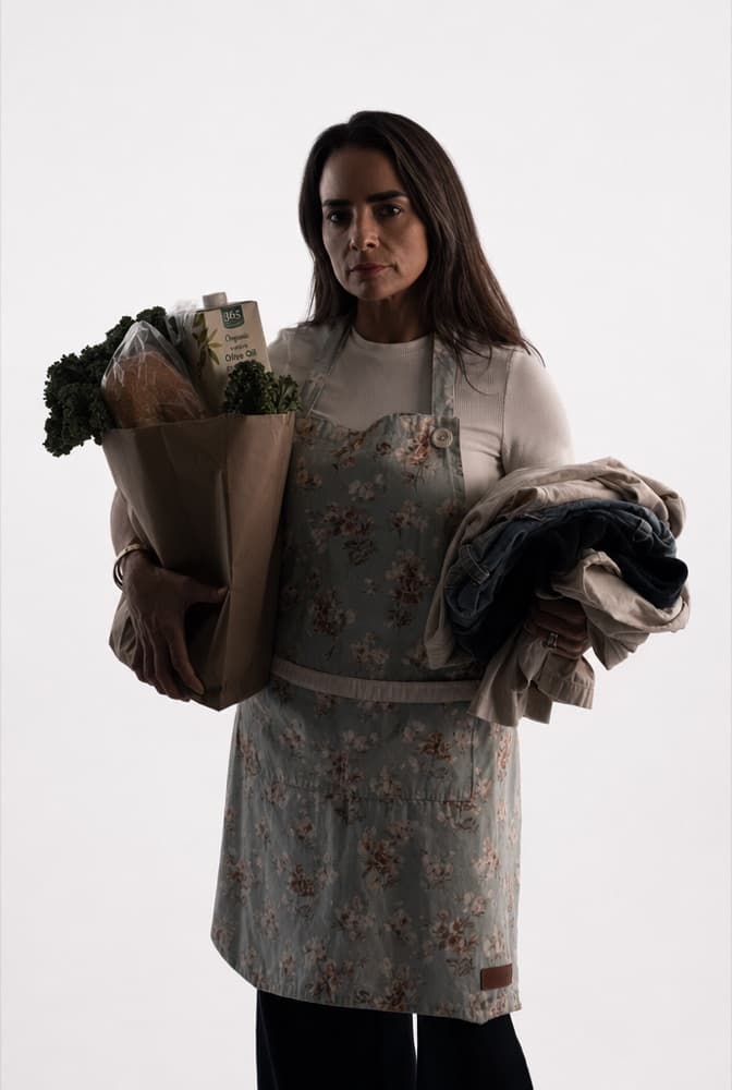Betty restyled into a cinematic aura-farm shot holding groceries, styled studio look.